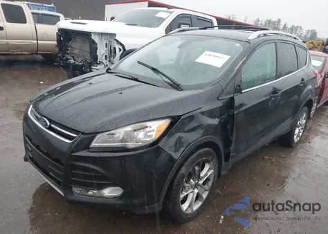 2014 Ford Escape Titanium z USA, uszkodzony, nr VIN 1FMCU9J97EUA51493